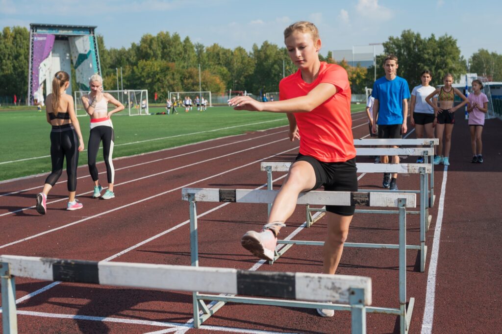 Students training at a stadium