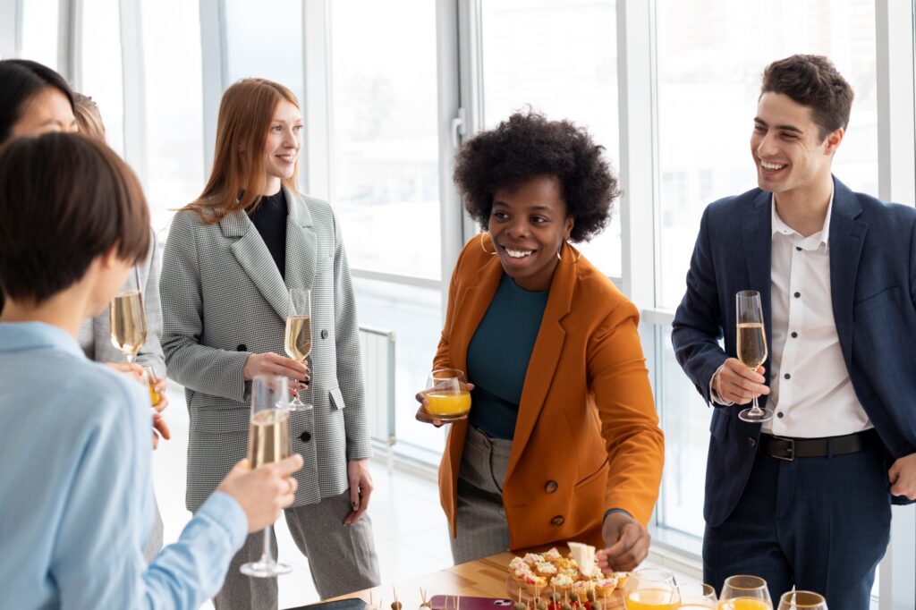 Employees during the office warming party