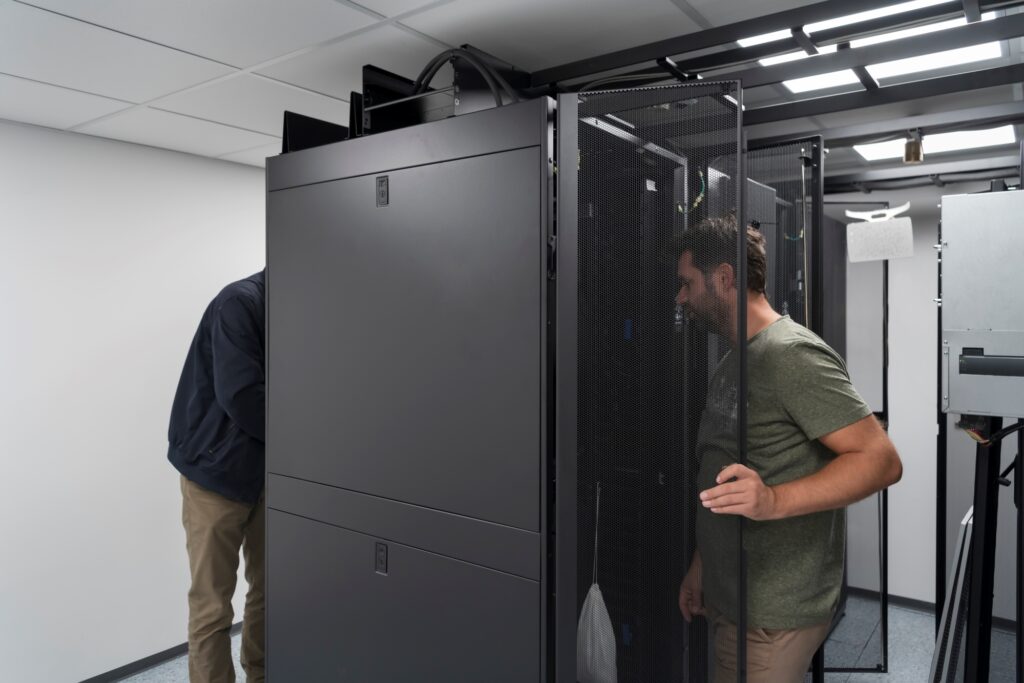 Engineers checking the IT servers of the new office